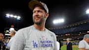 Oct 20, 2024; Los Angeles, California, USA; Los Angeles Dodgers pitcher Clayton Kershaw (22) celebrates after beating the New York Mets during game six of the NLCS for the 2024 MLB playoffs at Dodger Stadium. Mandatory Credit: Kiyoshi Mio-Imagn Images
