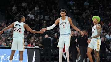 Dec 8, 2024; San Antonio, Texas, USA;  San Antonio Spurs guard Devin Vassell (24), center Victor Wembanyama (1), and forward Jeremy Sochan (10) in the first half against the New Orleans Pelicansn at Frost Bank Center. Mandatory Credit: Daniel Dunn-Imagn Images