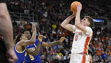 Mar 20, 2025; Providence, RI, USA; Clemson Tigers center Viktor Lakhin (0) shoots the ball against the McNeese State Cowboys during the first half at Amica Mutual Pavilion. Mandatory Credit: Eric Canha-Imagn Images