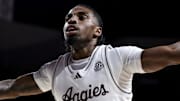 Nov 25, 2025; College Station, Texas, USA; Texas A&M Aggies guard Marcus Hill (0) blocks against the Mississippi Valley State Delta Devils during the first half at Reed Arena. Mandatory Credit: Maria Lysaker-Imagn Images 