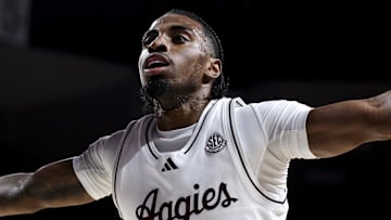 Nov 25, 2025; College Station, Texas, USA; Texas A&M Aggies guard Marcus Hill (0) blocks against the Mississippi Valley State Delta Devils during the first half at Reed Arena. Mandatory Credit: Maria Lysaker-Imagn Images 