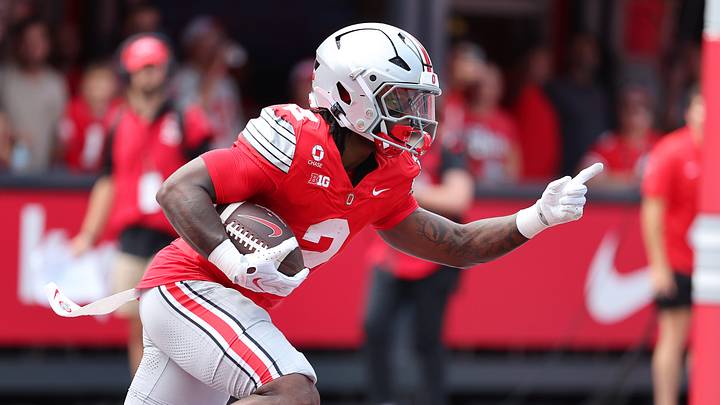 Sep 5, 2026; Columbus, Ohio, USA;  Ohio State Buckeyes running back Legend Bey (2) carries the ball during the first quarter against the Ball State Cardinals at Ohio Stadium.  Mandatory Credit: Joseph Maiorana-Imagn Images