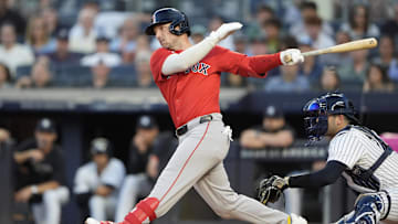 Aug 22, 2025; Bronx, New York, USA; Boston Red Sox third baseman Alex Bregman (2) hits a single against the New York Yankees during the first inning at Yankee Stadium. Mandatory Credit: Gregory Fisher-Imagn Images
