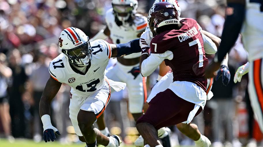 Auburn linebacker Xavier Atkins defends in coverage against Texas A&M wide receiver KC Concepcion last season.