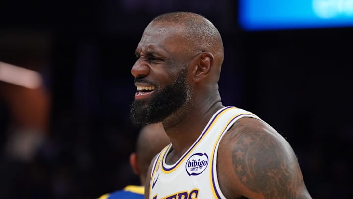Feb 28, 2026; San Francisco, California, USA;  Los Angeles Lakers forward LeBron James (23) grimaces as he waits for play to resume against the Golden State Warriors in the third period at Chase Center. Mandatory Credit: David Gonzales-Imagn Images
