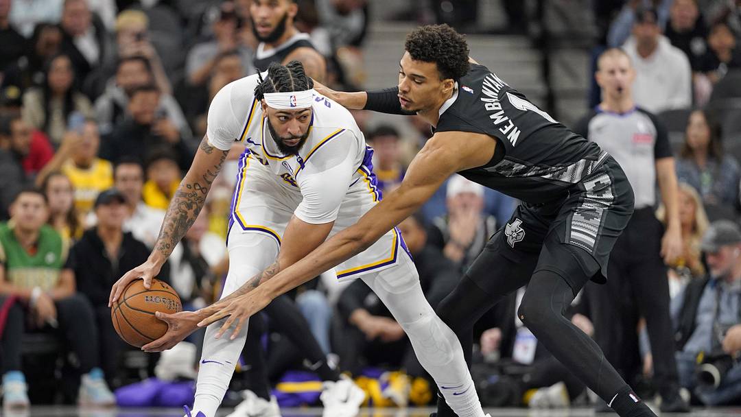 Los Angeles Lakers forward Anthony Davis (3) looks to pass the ball while defended by San Antonio Spurs center Victor Wembanyama (1) during the first half during the first half at Frost Bank Center. Mandatory Credit: Scott Wachter-Imagn Images Los Angeles Lakers forward Anthony Davis (3) looks to pass the ball while defended by San Antonio Spurs center Victor Wembanyama (1) during the first half during the first half at Frost Bank Center. Mandatory Credit: Scott Wachter-Imagn Images