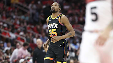 Mar 12, 2025; Houston, Texas, USA; Phoenix Suns forward Kevin Durant (35) reacts after a play during the first half against the Houston Rockets at Toyota Center. Mandatory Credit: Troy Taormina-Imagn Images