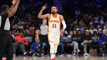 Apr 11, 2025; Philadelphia, Pennsylvania, USA; Atlanta Hawks guard Trae Young (11) reacts after scoring against the Philadelphia 76ers in the fourth quarter at Wells Fargo Center. Mandatory Credit: Kyle Ross-Imagn Images