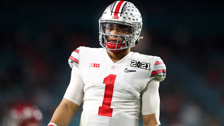 Jan 11, 2021; Miami Gardens, Florida, USA; Ohio State Buckeyes quarterback Justin Fields (1) against the Alabama Crimson Tide in the 2021 CFP National Championship Game. Mandatory Credit: Mark J. Rebilas-Imagn Images