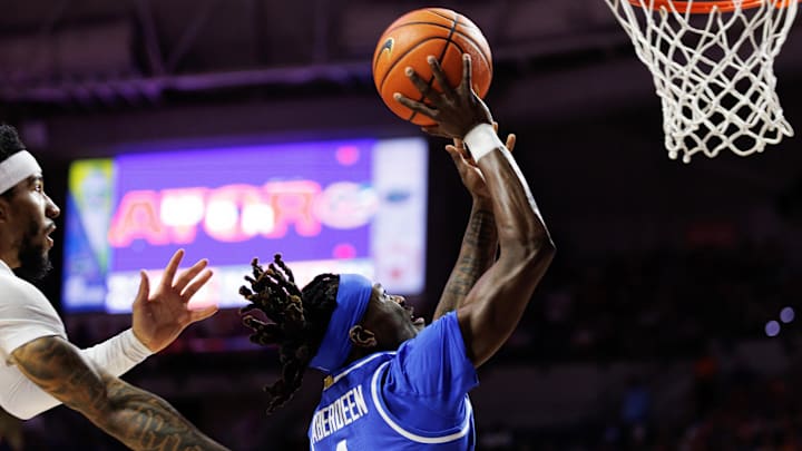 Feb 14, 2026; Gainesville, Florida, USA; Florida Gators guard Xaivian Lee (1) shoots the ball over Florida Gators guard Boogie Fland (0) during the first half at Exactech Arena at the Stephen C. O'Connell Center. Mandatory Credit: Matt Pendleton-Imagn Images