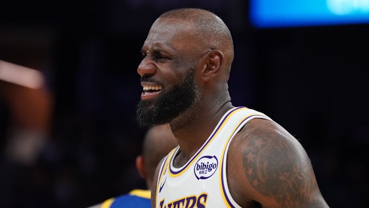 Feb 28, 2026; San Francisco, California, USA;  Los Angeles Lakers forward LeBron James (23) grimaces as he waits for play to resume against the Golden State Warriors in the third period at Chase Center. Mandatory Credit: David Gonzales-Imagn Images