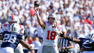 Ohio State Buckeyes quarterback Will Howard (18) throws during the first half of the NCAA football game against the Penn State Nittany Lions at Beaver Stadium in University Park, Pa. on Saturday, Nov. 2, 2024.