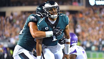 Sep 19, 2022; Philadelphia, Pennsylvania, USA; Philadelphia Eagles quarterback Jalen Hurts (1) celebrates his 26-yard touchdown run with tight end Dallas Goedert (88) against the Minnesota Vikings during the second quarter at Lincoln Financial Field. Mandatory Credit: Eric Hartline-Imagn Images