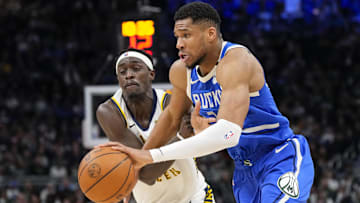 Mar 15, 2025; Milwaukee, Wisconsin, USA;  Milwaukee Bucks forward Giannis Antetokounmpo (34) drives for the basket against Indiana Pacers forward Pascal Siakam (43) during the third quarter at Fiserv Forum. Mandatory Credit: Jeff Hanisch-Imagn Images