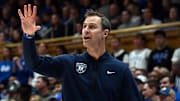 Jan 11, 2025; Durham, North Carolina, USA;  Duke Blue Devils head coach Jon Scheyer calls a play during the second half against the Notre Dame Fighting Irish at Cameron Indoor Stadium. Mandatory Credit: Rob Kinnan-Imagn Images