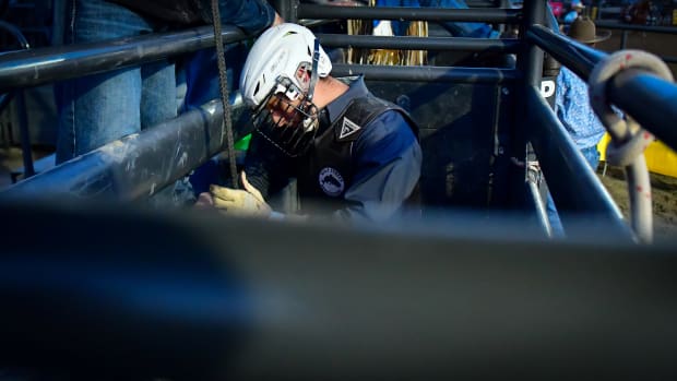 Jace Trosclair prepares to ride a bull