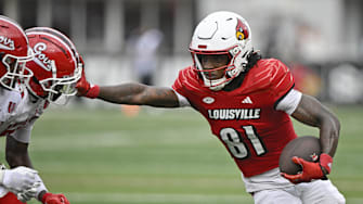 Aug 31, 2024; Louisville, Kentucky, USA;  Louisville Cardinals wide receiver Cataurus Hicks (81) runs the ball against the Austin Peay Governors during the second quarter at L&N Federal Credit Union Stadium. 