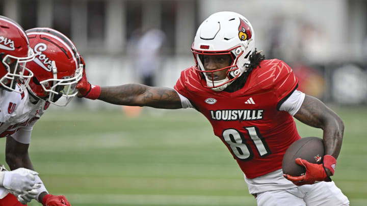 Aug 31, 2024; Louisville, Kentucky, USA;  Louisville Cardinals wide receiver Cataurus Hicks (81) runs the ball against the Austin Peay Governors during the second quarter at L&N Federal Credit Union Stadium. Mandatory Credit: Jamie Rhodes-USA TODAY Sports