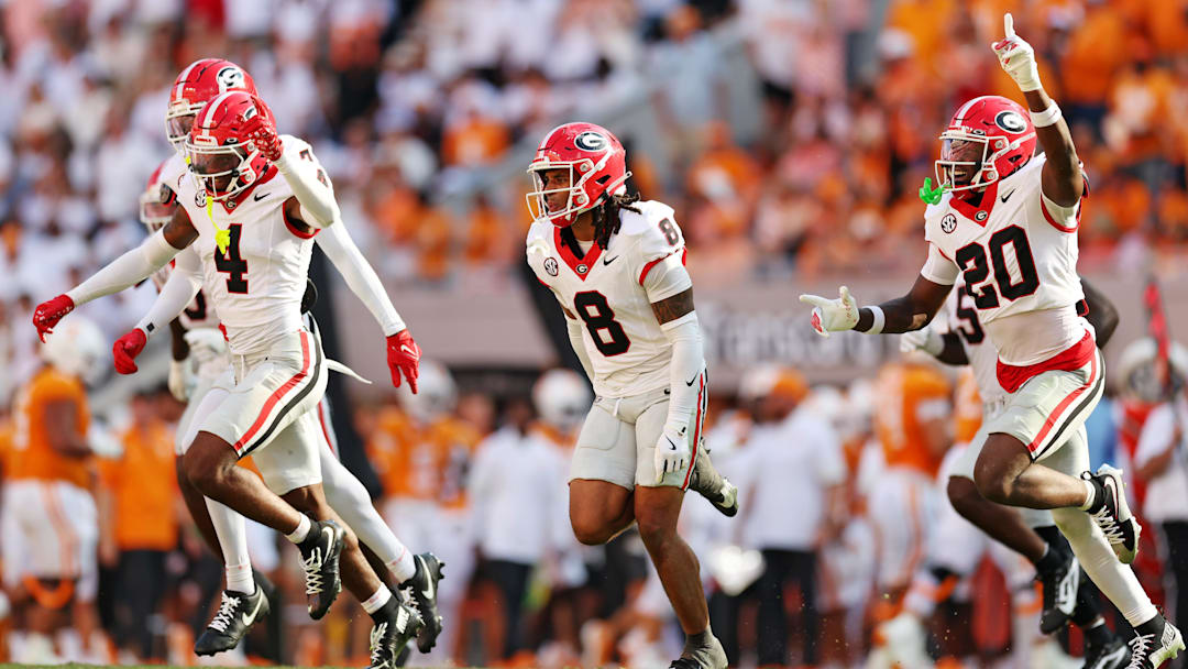 Sep 13, 2025; Knoxville, Tennessee, USA; Georgia Bulldogs defensive back Joenel Aguero (8) celebrates after a play with teammates during the second half against Tennessee Volunteers at Neyland Stadium. Mandatory Credit: Alan Poizner-Imagn Images