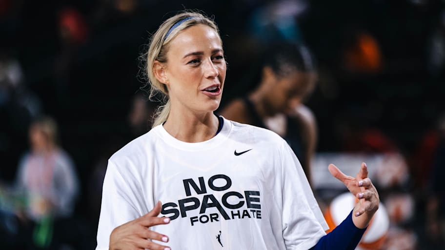 Indiana Fever guard Sophie Cunningham (8) talks with her teammates before the game against the Washington Mystics at Entertainment & Sports Arena. | Emily Faith Morgan-Imagn Images