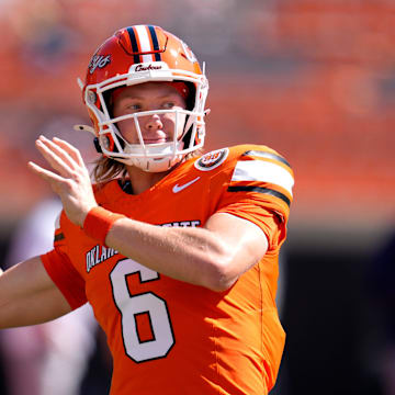 Oklahoma State Cowboys quarterback Zane Flores (6) warms up before a college football game between the Oklahoma State Cowboys (OSU) and the West Virginia Mountaineers at Boone Pickens Stadium in Stillwater, Okla., Saturday, Oct. 5, 2024.