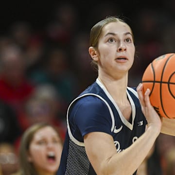 Penn State Nittany Lions guard Shay Ciezki (4) shoots a three point basket during the first half at Xfinity Center.