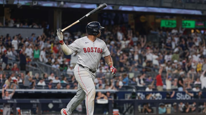 Jul 7, 2024; Bronx, New York, USA; Boston Red Sox third baseman Rafael Devers (11) reacts after his solo home run during the seventh inning against the New York Yankees at Yankee Stadium. Mandatory Credit: Vincent Carchietta-USA TODAY Sports