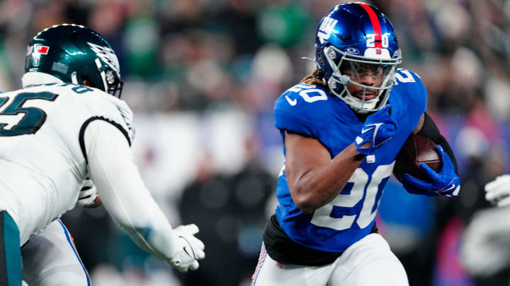 New York Giants running back Eric Gray (20) runs with the ball in the fourth quarter, Sunday, January 7, 2024.