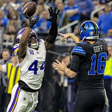 Jan 5, 2025; Detroit, Michigan, USA; Minnesota Vikings safety Josh Metellus (44) tips a pass by Detroit Lions quarterback Jared Goff (16) which was intercepted by Minnesota Vikings linebacker Ivan Pace Jr. (0) during the first half at Ford Field.