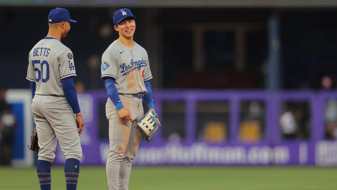 May 7, 2025; Miami, Florida, USA; Los Angeles Dodgers shortstop Mookie Betts (50) celebrates with second baseman Hyeseong Kim (6) after the game against the Miami Marlins at loanDepot Park. Mandatory Credit: Sam Navarro-Imagn Images