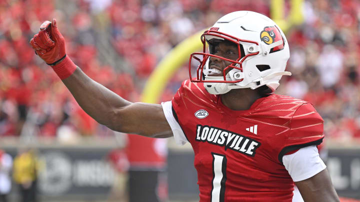 Aug 31, 2024; Louisville, Kentucky, USA;  Louisville Cardinals wide receiver Ja'Corey Brooks (1) celebrates after scoring a touchdown against the Austin Peay Governors during the first quarter at L&N Federal Credit Union Stadium. 