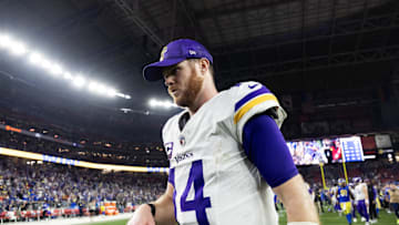 Jan 13, 2025; Glendale, AZ, USA; Minnesota Vikings quarterback Sam Darnold (14) reacts as he walks off the field after losing to the Los Angeles Rams during an NFC wild card game at State Farm Stadium. Mandatory Credit: Mark J. Rebilas-Imagn Images
