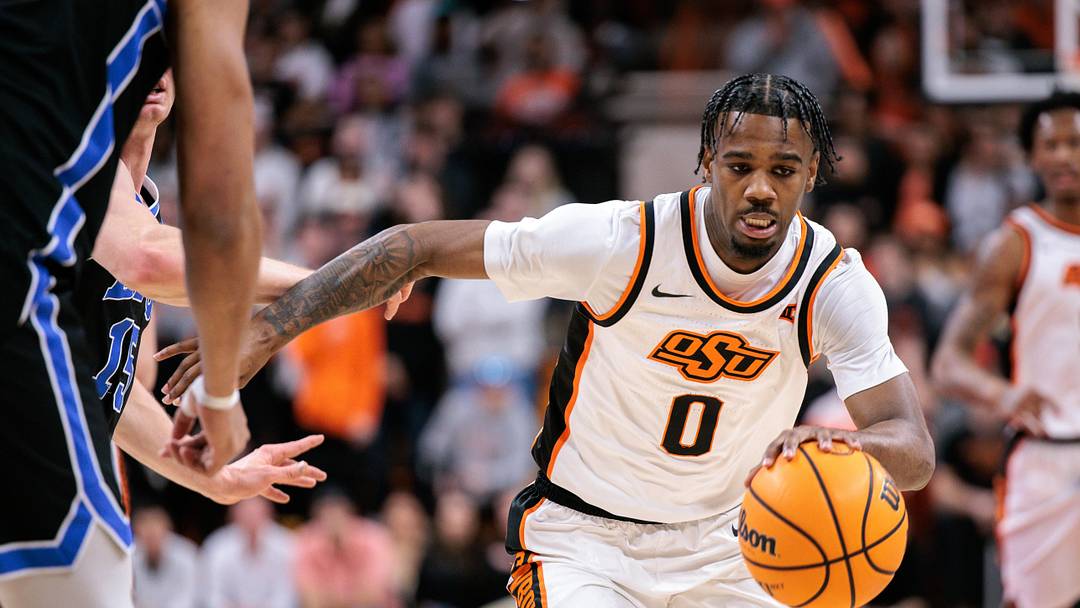 Feb 4, 2026; Stillwater, Oklahoma, USA; Oklahoma State Cowboys guard Jaylen Curry (0) dribbles during the first half against the BYU Cougars at Gallagher-Iba Arena. Mandatory Credit: William Purnell-Imagn Images
