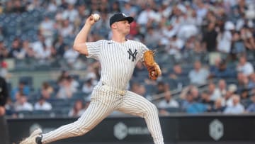 May 21, 2024; Bronx, New York, USA; New York Yankees starting pitcher Clarke Schmidt (36) delivers a pitch during the third inning against the Seattle Mariners at Yankee Stadium. Mandatory Credit: Vincent Carchietta-USA TODAY Sports