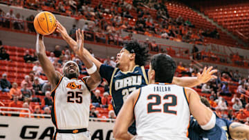 Nov 4, 2025; Stillwater, Oklahoma, USA; Oklahoma State Cowboys forward Robert Jennings (25) shoots the ball during the first half against the Oral Roberts Golden Eagles at Gallagher-Iba Arena. Mandatory Credit: William Purnell-Imagn Images