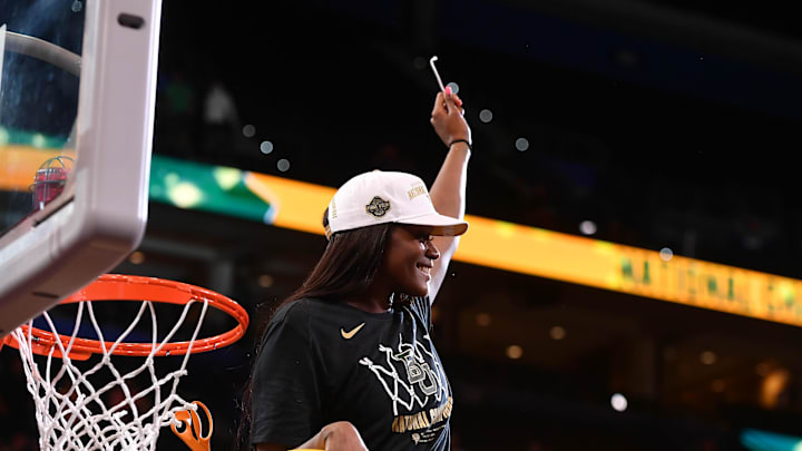 Apr 7, 2019; Tampa, FL, USA; Baylor Lady Bears center Kalani Brown (21) cuts the net after defeating the Notre Dame Fighting Irish to win the championship game of the women's Final Four of the 2019 NCAA Tournament at Amalie Arena. Mandatory Credit: Jasen Vinlove-Imagn Images