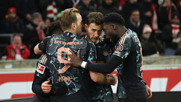 Bayern Munich players celebrating a goal against VfB Stuttgart on matchday 24.