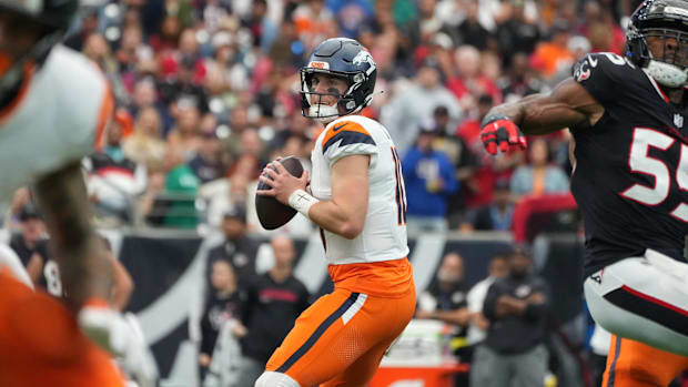 Nov 2, 2025; Houston, Texas, USA; Denver Broncos quarterback Bo Nix (10) drops to throw during the first half against the Hou