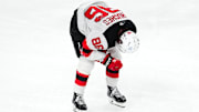 Mar 2, 2025; Las Vegas, Nevada, USA; New Jersey Devils center Jack Hughes (86) makes his way off the ice after sustaining an apparent injury during a play against the Vegas Golden Knights during the third period at T-Mobile Arena. Mandatory Credit: Stephen R. Sylvanie-Imagn Images