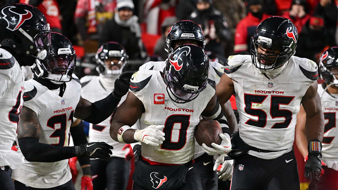 Dec 7, 2025; Kansas City, Missouri, USA; Houston Texans linebacker Azeez Al-Shaair (0) celebrates with his teammates after an interception during the fourth quarter against the Kansas City Chiefs at GEHA Field at Arrowhead Stadium. Mandatory Credit: Amy Kontras-Imagn Images