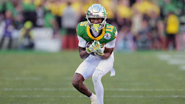 Jan 1, 2025; Pasadena, CA, USA; Oregon Ducks wide receiver Tez Johnson (15) makes a catch in the first half against the Ohio State Buckeyes in the 2025 Rose Bowl college football quarterfinal game at Rose Bowl Stadium.
