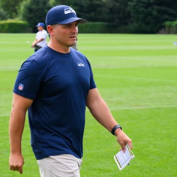 Jul 27, 2024; Renton, WA, USA; Seattle Seahawks head coach Michael Macdonald walks off the field after training camp at Virginia Mason Athletic Center. 