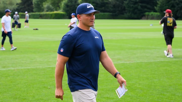 Jul 27, 2024; Renton, WA, USA; Seattle Seahawks head coach Michael Macdonald walks off the field after training camp at Virginia Mason Athletic Center. 