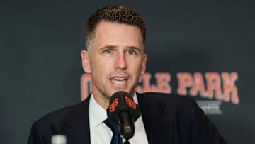 Dec 12, 2024; San Francisco, CA, USA; San Francisco Giants president of baseball operations Buster Posey speaks during the introductory press conference for shortstop Willy Adames (not pictured) at Oracle Park.
