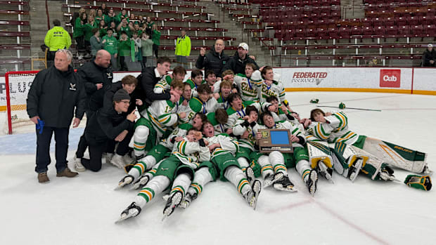 Edina with the 2025 Class 2A, Section 6 trophy after defeating Wayzata 4-1 at Ridder Arena. 
