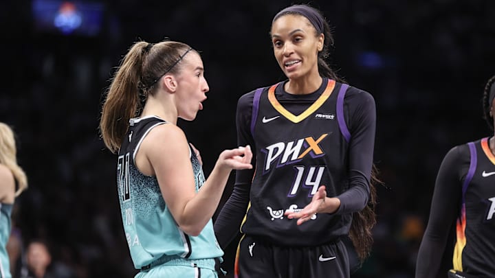 Jul 25, 2025; Brooklyn, New York, USA; New York Liberty guard Sabrina Ionescu (20) and Phoenix Mercury forward DeWanna Bonner (14) at Barclays Center. Mandatory Credit: Wendell Cruz-Imagn Images Jul 25, 2025; Brooklyn, New York, USA; New York Liberty guard Sabrina Ionescu (20) and Phoenix Mercury forward DeWanna Bonner (14) at Barclays Center. Mandatory Credit: Wendell Cruz-Imagn Images