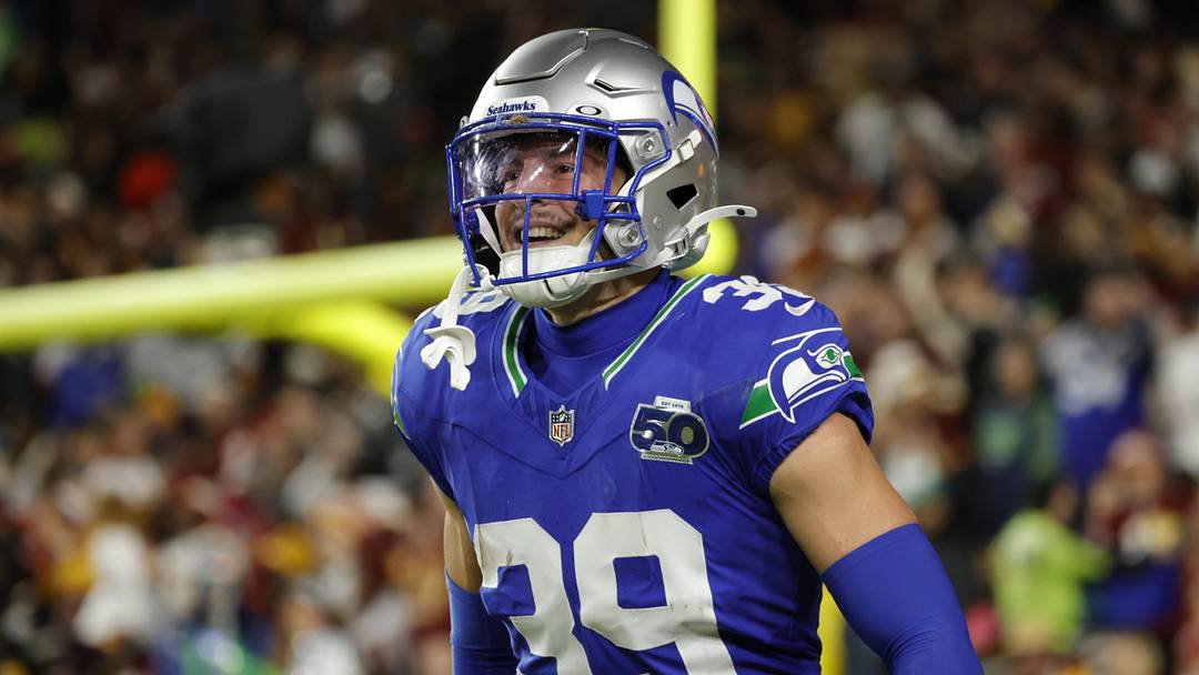 Seattle Seahawks safety Ty Okada celebrates a pass interception during the first half against the Washington Commanders. Seattle Seahawks safety Ty Okada celebrates a pass interception during the first half against the Washington Commanders.