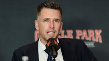 Dec 12, 2024; San Francisco, CA, USA; San Francisco Giants president of baseball operations Buster Posey speaks during the introductory press conference for shortstop Willy Adames (not pictured) at Oracle Park.   Mandatory Credit: Robert Edwards-Imagn Images