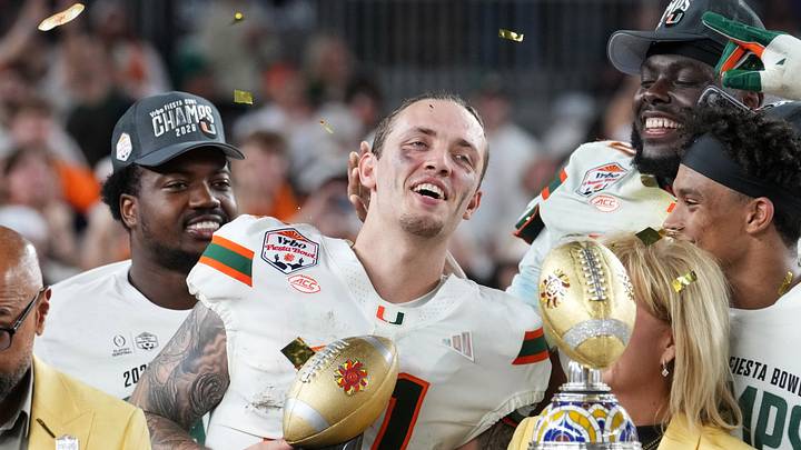 Miami Hurricanes quarterback Carson Beck (11) is named offensive player of the game after their 31-27 win over the Ole Miss Rebels during their Vrbo Fiesta Bowl matchup at State Farm Stadium on Jan. 8, 2026.