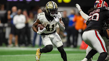 Sep 29, 2024; Atlanta, Georgia, USA; New Orleans Saints running back Alvin Kamara (41) runs the ball against the Atlanta Falcons in the fourth quarter at Mercedes-Benz Stadium. Mandatory Credit: Brett Davis-Imagn Images